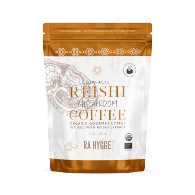 Sachet de café bio au reishi, logo de certification et design élégant en couleurs dorées.